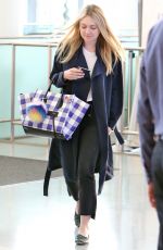 DAKOTA FANNING at Pearson International Airport in Toronto 07/11/2016