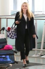 DAKOTA FANNING at Pearson International Airport in Toronto 07/11/2016