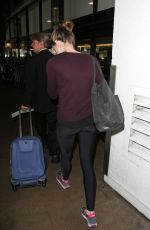 DANIELLE PANABAKER Flashes Engagement Ring at LAX Airport 07/20/2016