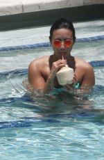 DEMI LOVATO in Bikini at a Pool in Miami 06/30/2016