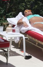 DEMI LOVATO in Bikini at a Pool in Miami 06/30/2016