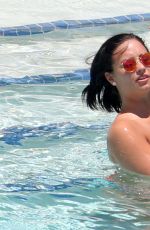 DEMI LOVATO in Bikini at a Pool in Miami 06/30/2016