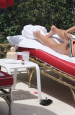 DEMI LOVATO in Bikini at a Pool in Miami 06/30/2016