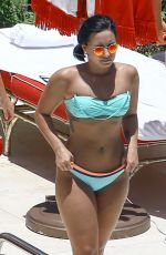 DEMI LOVATO in Bikini at a Pool in Miami 06/30/2016