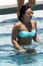 DEMI LOVATO in Bikini at a Pool in Miami 06/30/2016