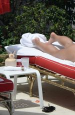 DEMI LOVATO in Bikini at a Pool in Miami 06/30/2016