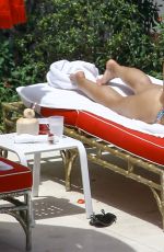 DEMI LOVATO in Bikini at a Pool in Miami 06/30/2016