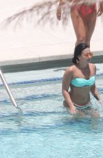 DEMI LOVATO in Bikini at a Pool in Miami 06/30/2016