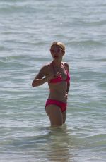 EMMA ROBERTS in Bikini at a Beach in Miami beach 07/14/2016