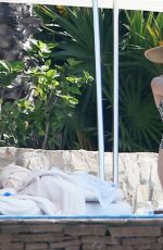 EMMY ROSSUM in Swimsuit on the Beach in Cabo San Lucas 07/03/2016