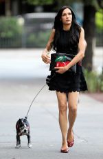 FAMKE JANSSEN Out and About with Her Dog in New York 07/02/2016