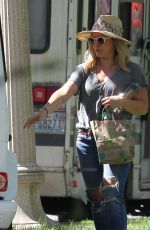HILARY DUFF in Ripped Jeans at a Park in New York 07/25/2016
