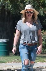 HILARY DUFF in Ripped Jeans at a Park in New York 07/25/2016