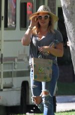 HILARY DUFF in Ripped Jeans at a Park in New York 07/25/2016