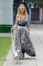 JOANNA KRUPA Walks Her Dog Out in Warsaw 07/16/2016