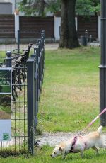 JOANNA KRUPA Walks Her Dog Out in Warsaw 07/16/2016