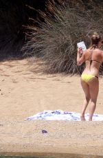 KATE HUDSON in Bikini at a Beach in Skiathos 07/24/2016