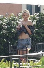 KATE HUDSON on the Balcony of Her Hotel in Rome 07/07/2016