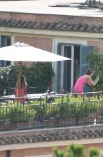 KATE HUDSON on the Balcony of Her Hotel in Rome 07/07/2016