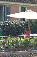 KATE HUDSON on the Balcony of Her Hotel in Rome 07/07/2016