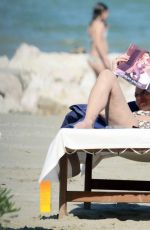 KATE MOSS in Bikini at a Beach in Venice 06/25/2016