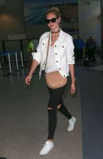KATE UPTON at LAX Airport in Los Angeles 07/19/2016