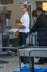 KATE UPTON at LAX Airport in Los Angeles 07/19/2016