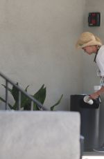 KELLY ROHRBACH Throwing Out Some Trash at a Valet in Santa Monica 07/21/2016