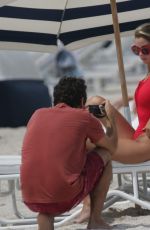KENNEDY BARNES in Swimsuit on the Set of a Photoshoot at a Beach in Miami 07/20/2016