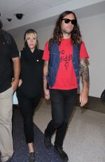 KESHA SEBERT at LAX Airport in Los Angeles 07/25/2016