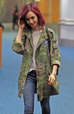 LILY COLLINS Arrives at Airport in Vancouver 07/28/2016.