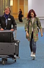 LILY COLLINS Arrives at Airport in Vancouver 07/28/2016.