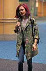 LILY COLLINS Arrives at Airport in Vancouver 07/28/2016.