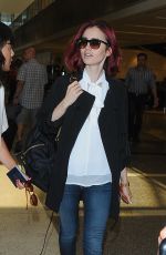 LILY COLLINS at LAX Airport in LosmAngeles 07/09/2016