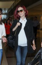 LILY COLLINS at LAX Airport in LosmAngeles 07/09/2016