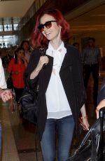 LILY COLLINS at LAX Airport in LosmAngeles 07/09/2016