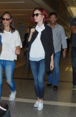 LILY COLLINS at LAX Airport in LosmAngeles 07/09/2016