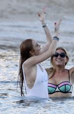 LINDSAY LOHAN and Egor Tarabasov at a Beach in Mykonos 07/03/2016