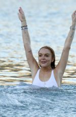 LINDSAY LOHAN and Egor Tarabasov at a Beach in Mykonos 07/03/2016