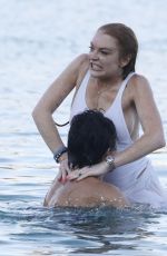 LINDSAY LOHAN and Egor Tarabasov at a Beach in Mykonos 07/03/2016