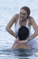 LINDSAY LOHAN and Egor Tarabasov at a Beach in Mykonos 07/03/2016