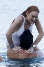 LINDSAY LOHAN and Egor Tarabasov at a Beach in Mykonos 07/03/2016