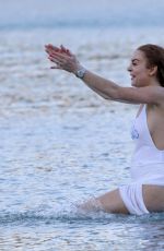 LINDSAY LOHAN and Egor Tarabasov at a Beach in Mykonos 07/03/2016