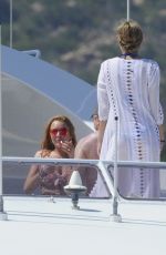 LINDSAY LOHAN in Bikini at a Yacht in Sardinia 07/27/2016