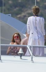 LINDSAY LOHAN in Bikini at a Yacht in Sardinia 07/27/2016