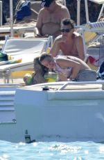 LINDSAY LOHAN in Bikini at a Yacht in Sardinia 07/27/2016