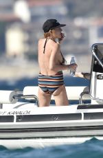 LINDSAY LOHAN in Swimsuit at a Boat in Sardinia 07/28/2016