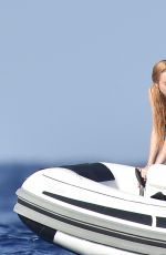 LINDSAY LOHAN in Swimsuit at a Boat in Sardinia 07/28/2016