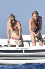 LINDSAY LOHAN in Swimsuit at a Boat in Sardinia 07/28/2016