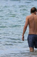 MARGOT ROBBIE in Bikini at a Beach in Hawaii 07/14/2016